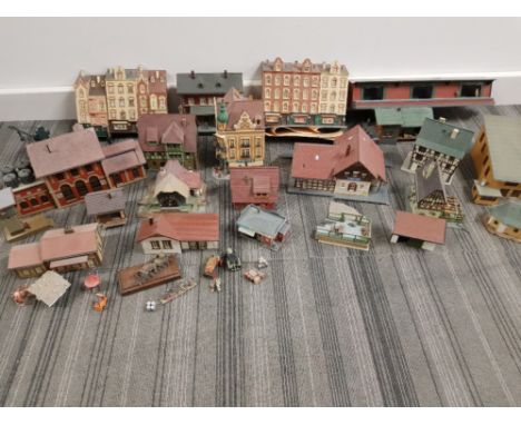 Box of miscellaneous model railroad buildings together with tub of train photographs