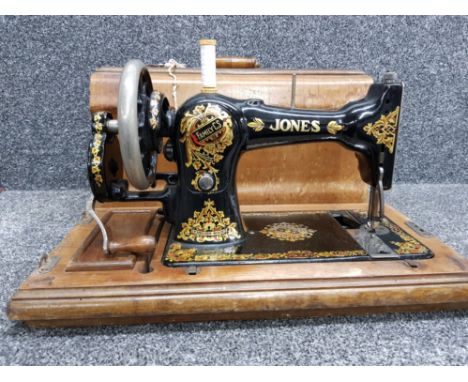 Vintage English made Jones sewing machine with original carry case, including key