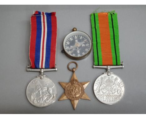 3 World war II medals includes defence &amp; war medal, The 1939-45 Star plus 1 other also includes vintage brass compass