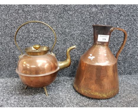 Vintage copper and brass kettle together with copper water jug
