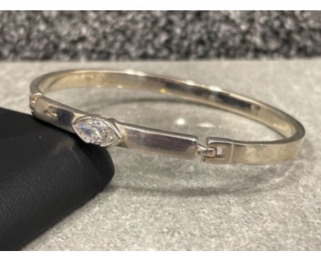 Ladies silver stone set bangle, comprising of a Marque shaped CZ