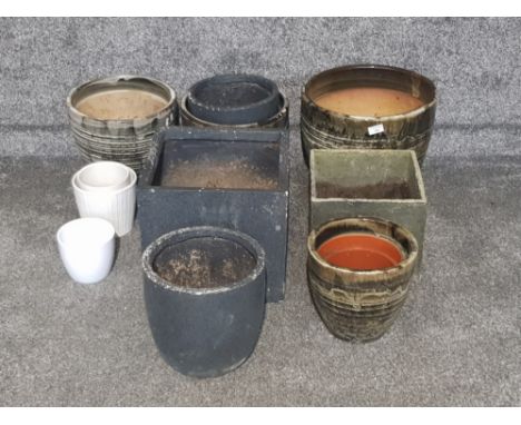 Ceramic and other plant pots of various sizes and designs.