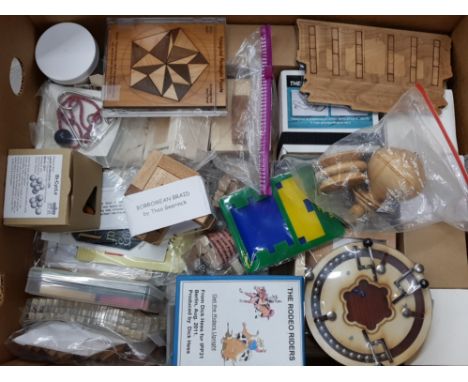 Box of vintage wooden puzzle games
