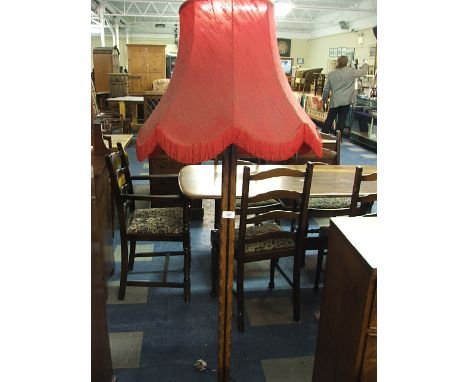 An Oak Standard Lamp.