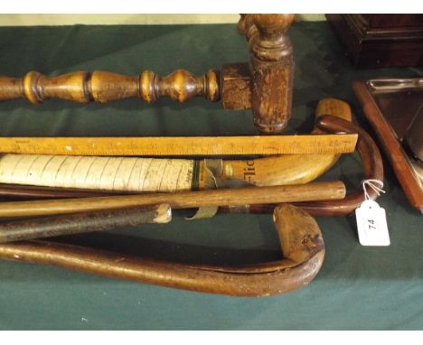 A Collection of Golf Clubs, Hockey Stick, Walking Canes etc.
