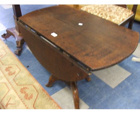 An Oak Drop Leaf Occasional on Tripod Base.