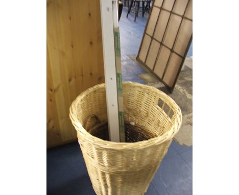 Two Wicker Baskets and a Strip Light.
