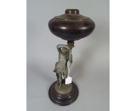 A Figural Spelter Oil Lamp Stand Depicting Egyptian Warrior. 