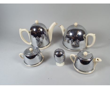 A Five Piece Chrome and Ceramic Tea Set.