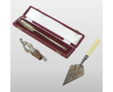 A replica Georgian silver marrow scoop, Sheffield 1966, cased, together with a silver plated presentation trowel inscribed 'S