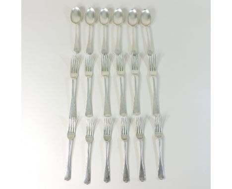 An Edwardian silver part table service, comprising six table forks, 20cm, six dessert forks and six table spoons, London 1904