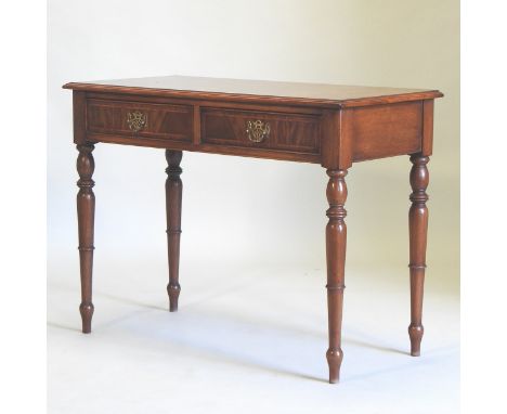 A bespoke made walnut side table, containing a pair of frieze drawers, on turned legs, 102cm