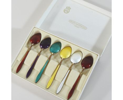 A harlequin set of six mid 20th century Norwegian silver gilt and enamelled coffee spoons, with engine turned decoration, by 