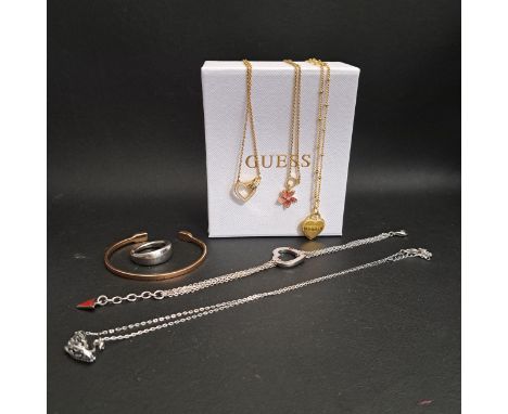SELECTION OF FASHION JEWELLERYcomprising a Guess Heart pendant on chain (with pouch and box), a Guess bracelet with heart det