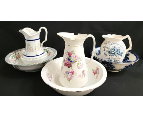 SELECTION OF EWERS AND BASINSincluding a matching Edwardian set with transfer print roses, a Copeland Spode jug, and a Corona