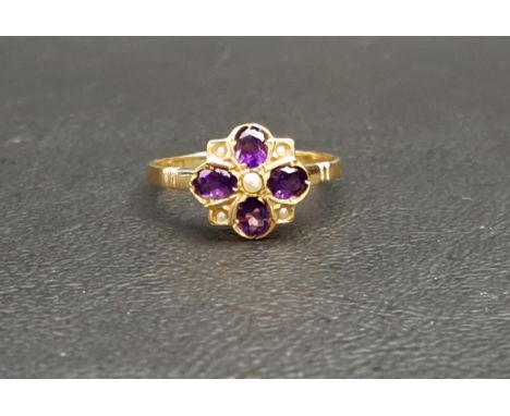 AMETHYST AND SEED PEARL CLUSTER RINGthe four oval cut amethysts interspersed with seed pearls, on nine carat gold shank, ring