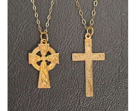 TWO NINE CARAT GOLD CROSS PENDANTSboth with engraved decoration, one a Celtic cross, both on nine carat gold chains, total we