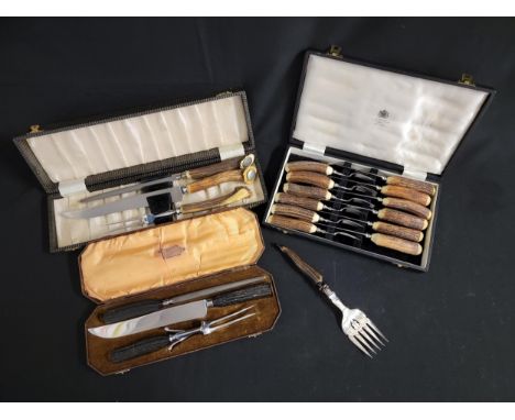 THREE VINTAGE CASED ANTLER HORN FLATWARE SETSconsisting of Mappin and Webb Antler horn handled six place setting knives and f