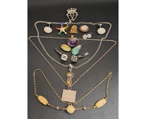 INTERESTING SELECTION OF SILVER AND OTHER JEWELLERYincluding a silver Claddagh brooch, a red cabochon set silver pendant on c