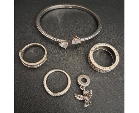 SELECTION OF FASHION JEWELLERYcomprising three Pandora silver rings - Forever ring, Sparkling Wishbone, and Flipping Hearts, 