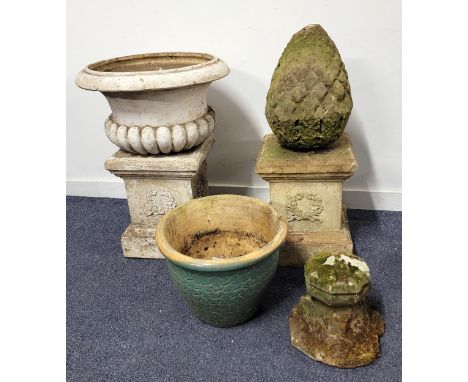 SELECTION OF VICTORIAN CONTRETE GARDEN ORNAMENTScomprising a ribbed jardiniere on stand, 51cm diameter; another square plinth