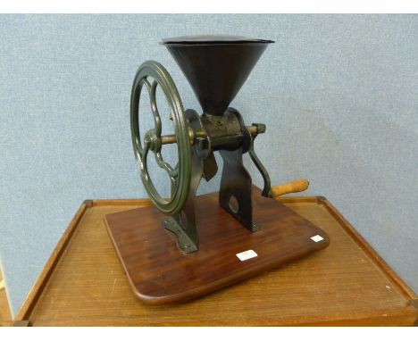 A cast iron grinder, made by Zachariah Parkes 