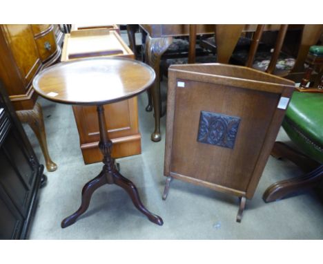 A mahogany tripod wine table and an oak firescreen 