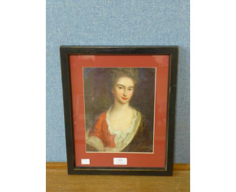 A half portrait print of a lady, framed 