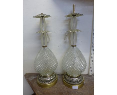 A pair of French style glass and gilt metal table lamp bases 