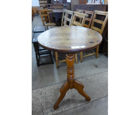 A Victorian mahogany and fruitwood tripod table 