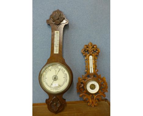 An early 20th Century Black Forest carved walnut aneroid barometer and another beech aneroid barometer 