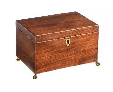 GEORGIAN MAHOGANY TEA CADDY FITTED WITH TWO COMPARTMENTS & BONE ESCUTCHEON.RAISED ON FOUR BALL & CLAW FEET.HEIGHT: 6 INCHES.W