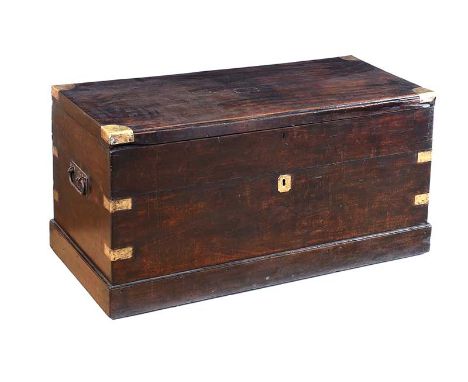 GEORGIAN MAHOGANY MILITARY BRASS BOUND TRUNK WITH STEEL DROP HANDLES & DOUBLE HINGED LID.HEIGHT: 21 INCHES.WIDTH: 40 INCHES.D