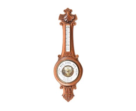 VICTORIAN CARVED OAK OPEN ESCAPEMENT BAROMETER WITH A DIAL OF 9 INCHES.R.MCDOWELL & CO, BELFAST.HEIGHT: 35 INCHES.WIDTH: 11 I