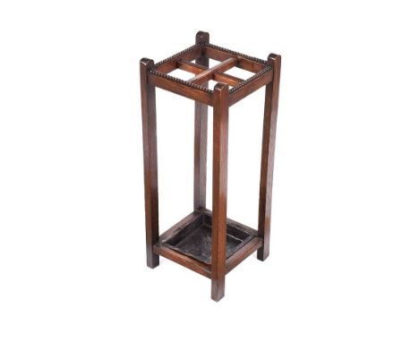 OAK STICK STAND WITH TIN LINER BASE.HEIGHT: 26 INCHES.WIDTH: 10 INCHES.DEPTH: 10 INCHES.IN GOOD CONDITION.