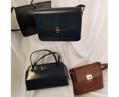 4 vintage leather handbags, 2 black,1 navy and 1 brown, in good condition, the brown has marks on front, makers names inside 