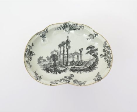A Worcester dessert dish  c.1770-75, printed in black with an unknown scene of two figures seated beneath Classical ruins, th