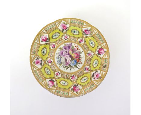 A large Derby plate  c.1800, richly decorated in the Church Gresley pattern with a central panel of flowers within a wide bor