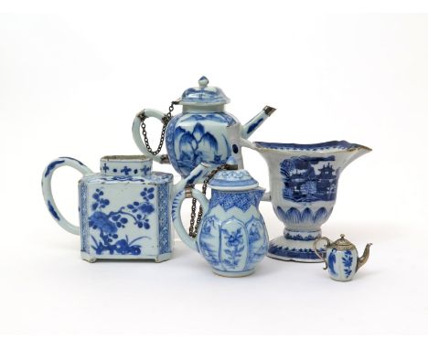 Two Chinese porcelain blue and white teapots and two jugs  18th century, one teapot of rounded square form and applied with E