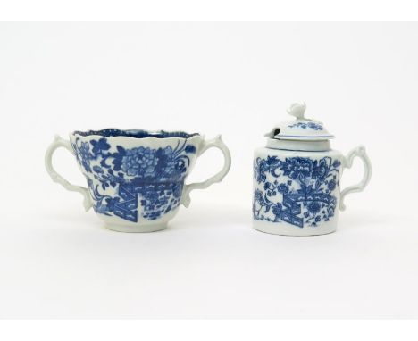 A Caughley blue and white mustard pot and cover  c.1780, printed with the Fence pattern, the cover with flower sprays, and a 