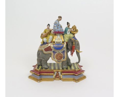 A large French porcelain pastille burner or vase and cover  late 19th/20th century, modelled as a richly caparisoned elephant