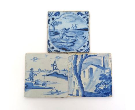 Three delftware blue and white tiles  18th century, one painted with a figure fishing from a bank, one with a figure kneeling