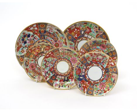 Four saucers and two saucer dishes from the Flight and Barr Worcester partnerships  late 18th/early 19th century, richly deco