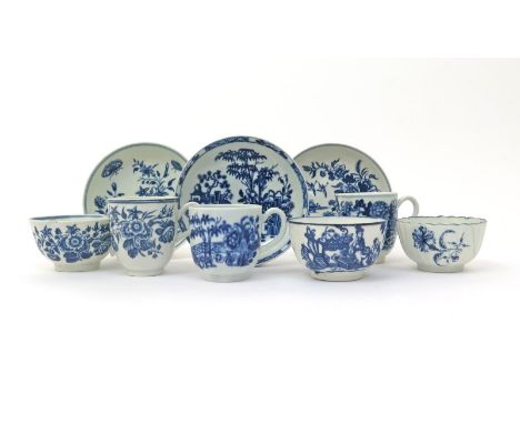 A Worcester blue and white trio and two coffee cups and saucers  c.1770-80, the trio printed with the Three Flowers pattern, 