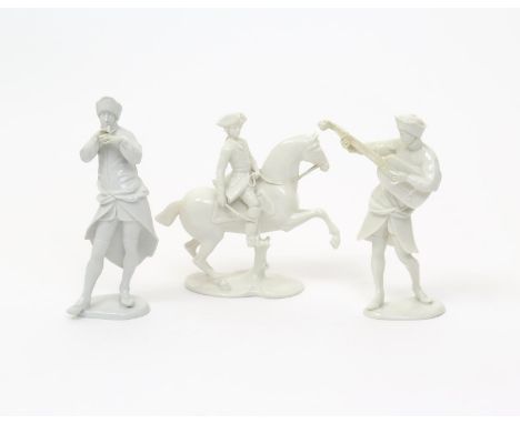 Three white-glazed Nymphenburg figures  20th century, two of musicians, one playing a pipe, the other a stringed instrument, 