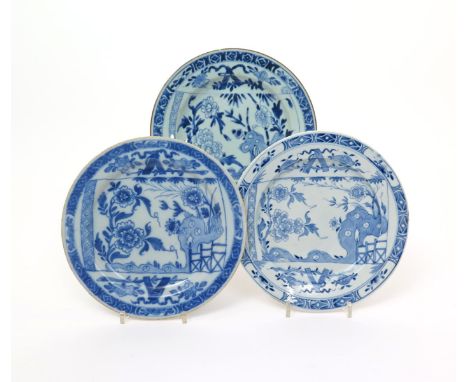 Three blue and white plates decorated with the Broken Scroll pattern  18th century, one Chinese porcelain, one Bow porcelain 