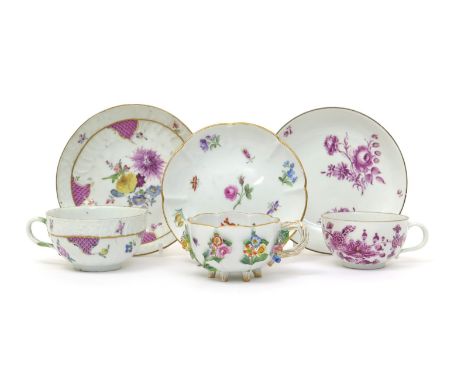 Two Meissen cups and saucers  19th century, one applied and painted with flowers, one painted with deutscheBlumen within moul