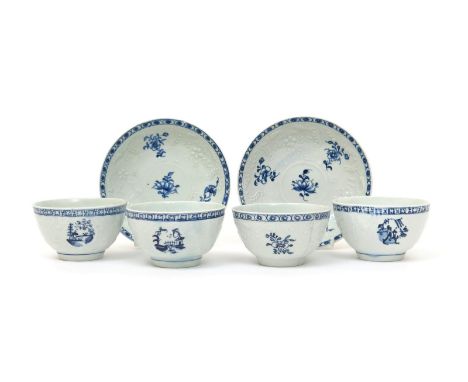 Four Lowestoft blue and white teabowls and two saucers   c.1765, of large or breakfast size, moulded in the Hughes manner wit