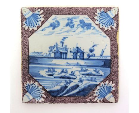 A London delftware tile  mid 18th century, decorated with an octagonal panel containing buildings with a smoking chimney in a