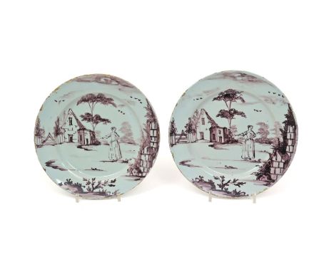 A pair of English delftware plates  c.1740-50, Lambeth or Wincanton, each decorated in manganese with a European scene of a l
